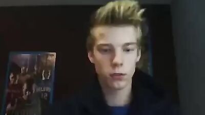 Young blond stud takes off his clothes and plays with himself in front of the camera!