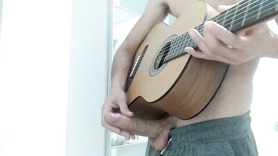 Funny Him Does a Guitar Solo With His Gigantic Cock and Ends with a Cumshot