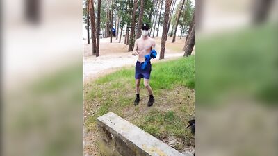 dressing up on a nudist beach, showing a cock