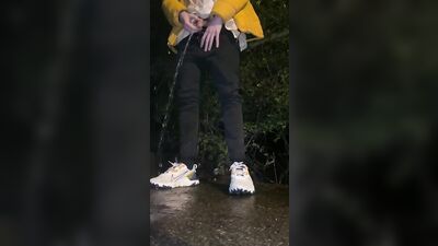 Twink boy pissing public after party