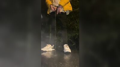 Twink boy pissing public after party