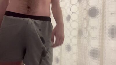 Huge cumshot, piss and shower in grey boxers