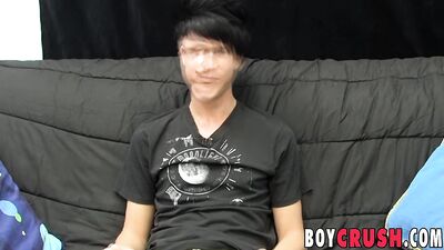 Young gay man jerks off his giant dick during an interview