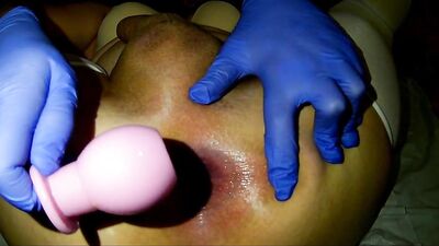 Sexy hot crossdresser plays with pink butt plug on quarantine