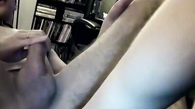 Emo twink strokes his penis while licking on delicious toes