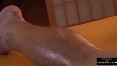 Massaged twink gets a naughty blowjob