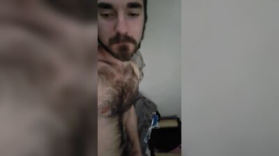 Scruffy armature shoots his load while keeping quiet