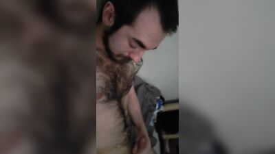 Scruffy armature shoots his load while keeping quiet