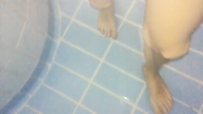 Twink feet in a pool - underwater view