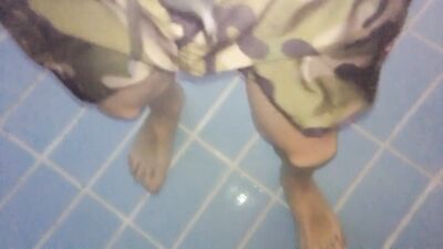 Twink feet in a pool - underwater view
