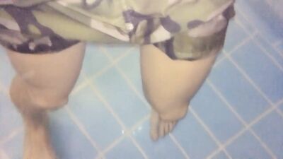 Twink feet in a pool - underwater view