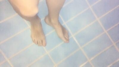 Twink feet in a pool - underwater view