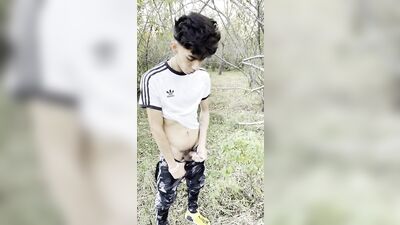 young latino Twink goes for a walk and ends up emptying his balls in the woods