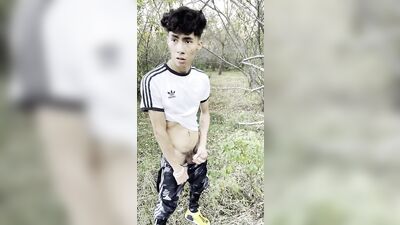 young latino Twink goes for a walk and ends up emptying his balls in the woods