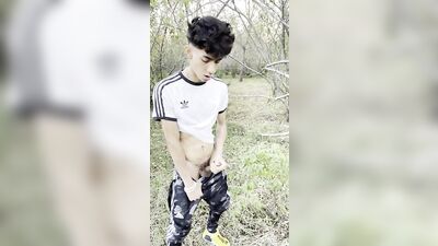 young latino Twink goes for a walk and ends up emptying his balls in the woods