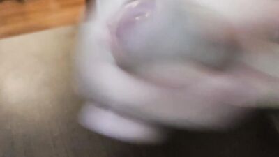 A closeup uncut precum and cumshot