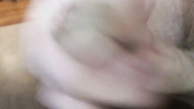 A closeup uncut precum and cumshot