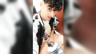 Quick peeing on a public toilet in a sitting position