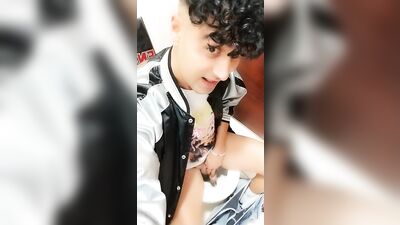 Quick peeing on a public toilet in a sitting position