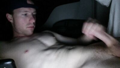 big load in car! wearing baseball cap