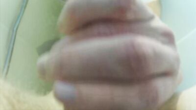 Underwater cumshot in the bathtub