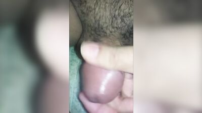 Asian boy sitting and showing his strong erection