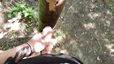 Cumshot on 'cum here' tree , showing cum close up and piss at a cruising area