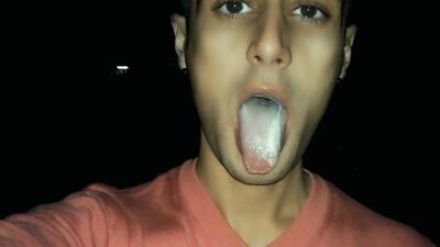 Chewing and making bubbles foam of friends cum public