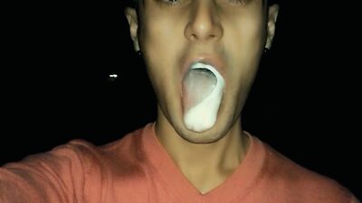 Chewing and making bubbles foam of friends cum public