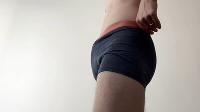 Twink in grey sweats slaps around his cock. HUGE cumshot