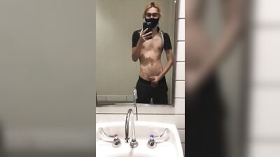 twink jerks off in public bathroom