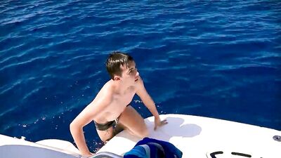 The Captain and his skipper fuck a young client on the boat