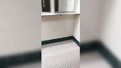 Risky twink showing off in college bathroom