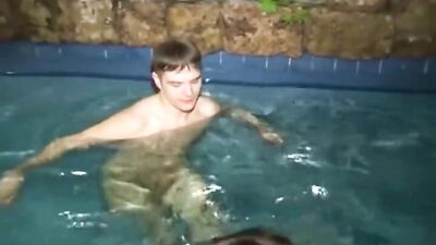 Two young hotties in pool: Bareback Big Cocks Handjob!