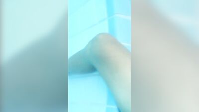 Pulling cock of swimtrunks in the public pool ( cock and feet underwater )