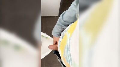 Fat soft cock piss at an public urinal