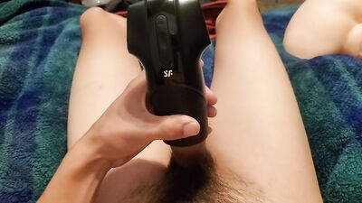 Young fit stud trying penis stimulator