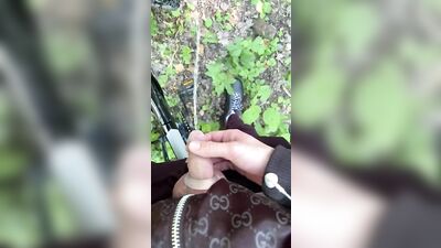 Young Twink pissing in the woods