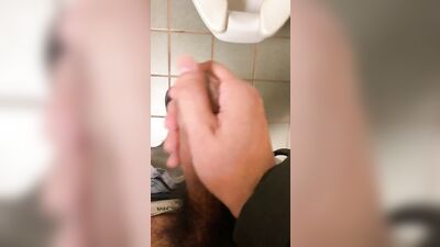 Me jerking off at public restroom stall and making a mess