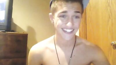 Nice looking boy jerks on his abs