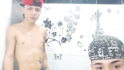 Two Smooth Latino Cuties Suck and Slide in the Shower!